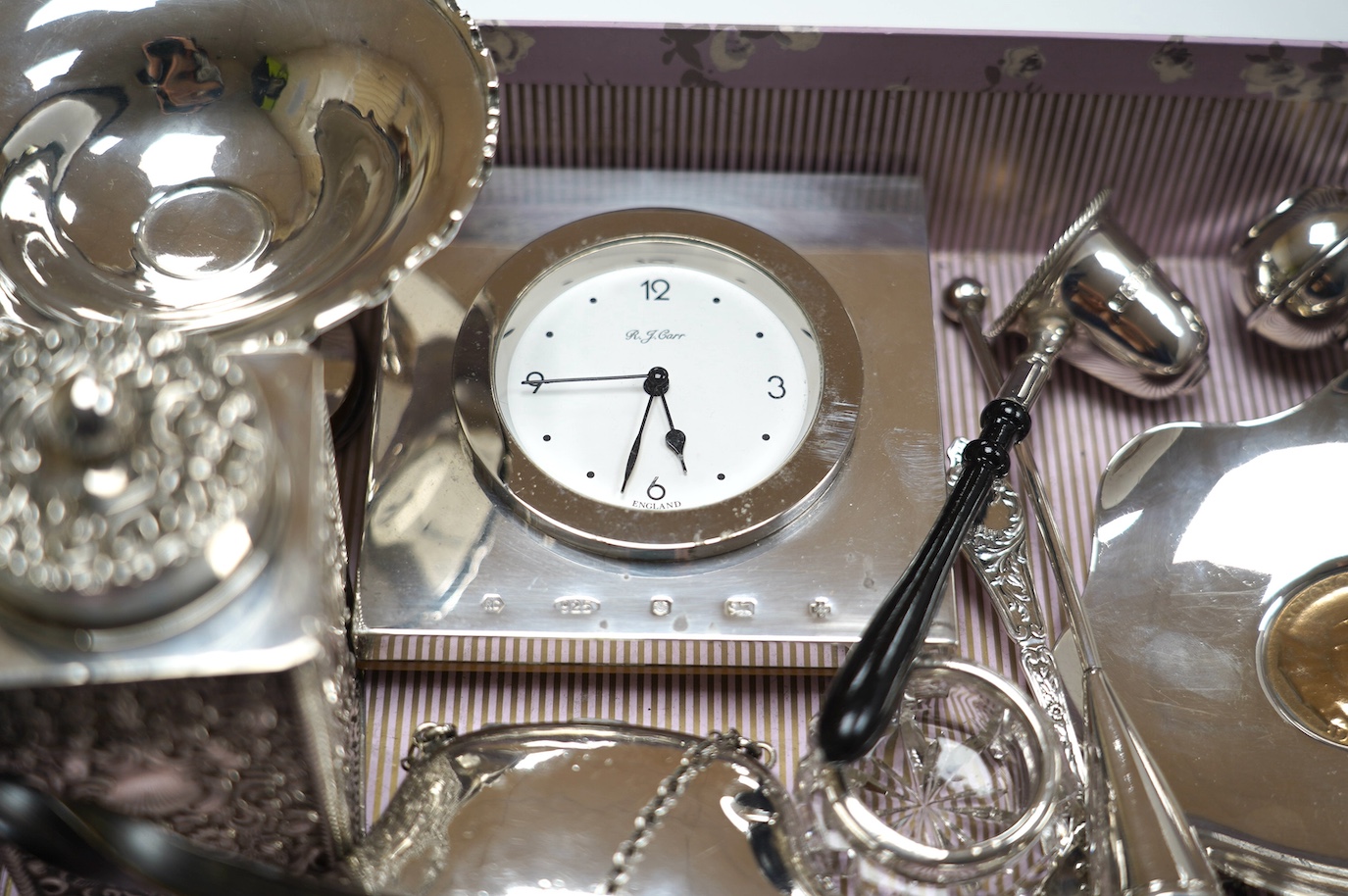 Sundry small silver including a late Victorian silver tea caddy (lid stuck), purse, tazza, modern timepiece, dish with inset coin, extinguisher, toddy ladle etc. and two plated items. Condition - poor to fair to good